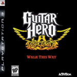 Guitar Hero: Aerosmith -pelin PS-version etukansi, jossa näkyy pelin & Aerosmithin logo mustaa taustaa vasten. Logojen alapuolella punaisella värillä sanat "Walk This Way".