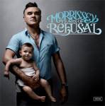 Morrisseyn "Years of Resusal" -albumin kannessa harmaa liukuvärjätty tausta, jonka päälle sijoitettu valokuva sinipaitaisesta miehestä, joka pitää pientä vauvaa sylissään toisella kädellään. Kuvan oikeassa yläkulmassa sinisellä värillä kaunokirjoituksella