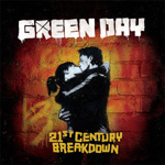Green Dayn albumin "21st Century Breakdown" etukannessa maalaus tai piirros rakastavaisista, jotka suutelevat toisiaan tiiliseinän edustalla. Bändin nimi yläosassa valkoisella. Alaosassa taas albumin nimi keltaisella värillä ja tuhdilla kirjasimella ladot