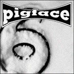 Pigfacen albumin etukansi on harmaasävyinen ja sen taustaväri on vaaleanharmaa. Kuvan yläosassa yhtyeen logo. Keskellä kuvaa jonkinlaisen musta rinkula, jonka ääriviivoista muodostuu suurikokoinen numero 6.
