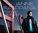 Janne Raappanan singlen "Rakkaus on hulluus" etukannessa valokuva mustaan takkiin pukeutuneesta miehestä, jolla muodikas musta tukka ja sininen paita takin alla. Kuvan taustalla tummansininen taivas ja jonkinlainen punainen metallipömpeli.