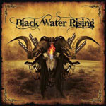 Black Water Risingin albumin "Black Water Rising" etukannessa näkyy jonkinlainen sarvekas hirviömäinen olento, joka nököttää ilmassa kellertävää taustaa vasten. Kuvan laidat mustiksi palaneet ja sen yläosassa näkyy mustalla värillä kirjoitettuna Black Wat
